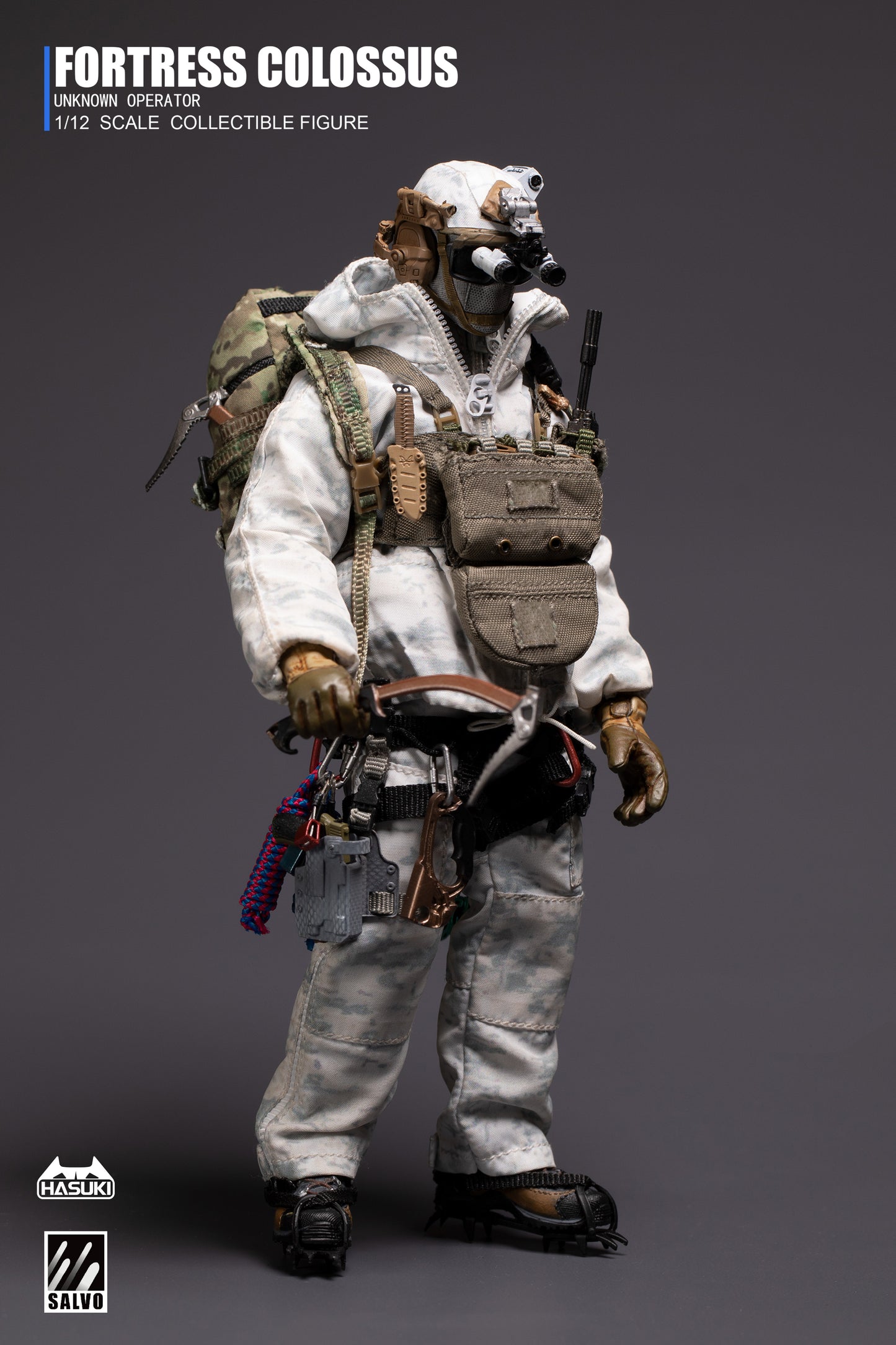 Snow camouflage suit and L7 cold weather jacket displayed flat with accessories