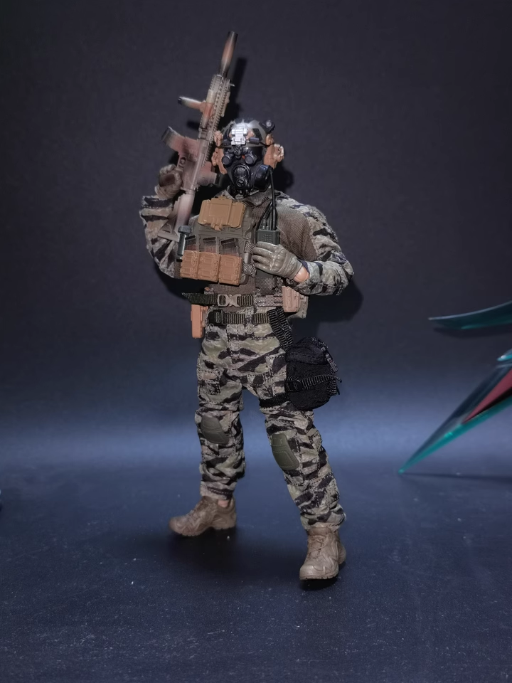 Box contents and packaging interior showing figure and accessories secured
